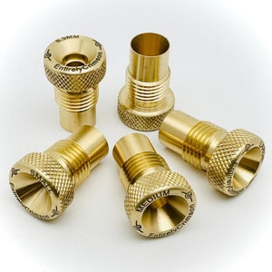 May include: Five gold-colored metal pieces with a threaded design and a funnel-shaped opening at the top. Each piece is labeled with the text "Entirely Crimson" and a size designation: "Small", "Medium", "6.5MM".