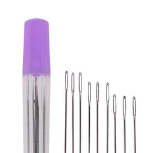 May include: A set of 10 silver sewing needles in a clear plastic case with a purple lid.