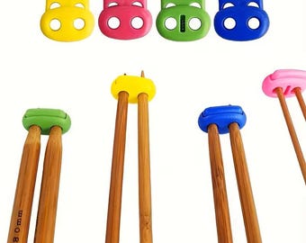 8 x Knitting Needle Stoppers Protectors Spring Loaded Assorted