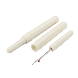 May include: Three off-white seam rippers of different sizes. Two are disassembled, revealing the hollow interior and pointed end. The third is assembled, with a silver blade and a red ball. These tools are used for removing stitches.