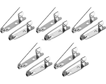 May include: A set of ten silver-toned safety pin closures. The pins are designed for attaching fabric, ribbon, or other materials to clothing or crafts.