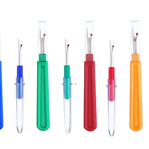 May include: Set of ten thread snips in various colours, including blue, green, red, orange, and clear. The snips have a small, sharp blade and a comfortable grip.