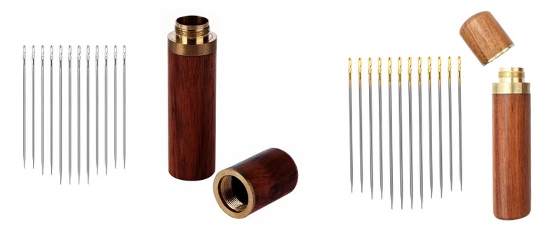 May include: A set of 15 sewing needles in a wooden case. The needles are silver with gold tips. The case is made of dark wood with a brass lid.