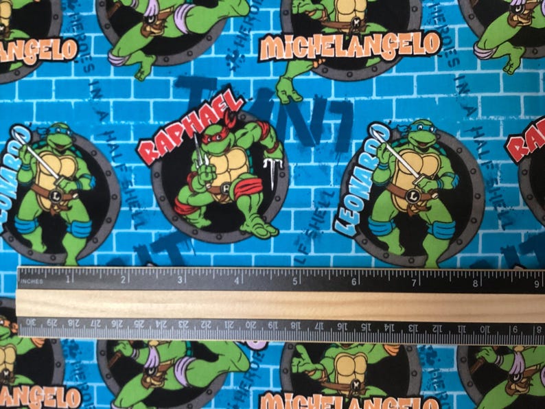 Ruler Turtle Teenage Mutant Ninja Turtles Sewer Holes Remnant 25 Inches Fabric ...