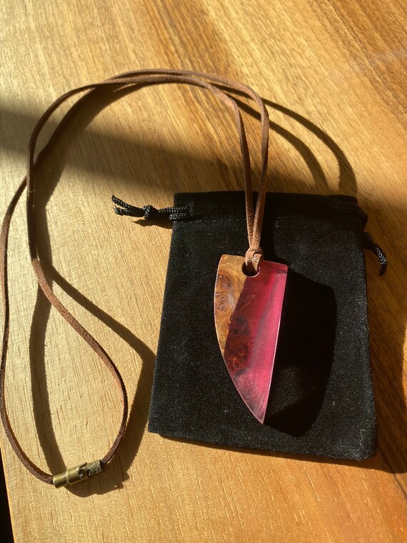 Charlie The Maker Tooth Pendant