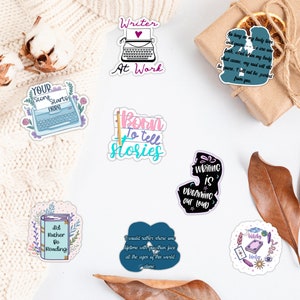 May include: A set of ten colorful stickers featuring quotes about writing and reading. The stickers are printed on white, round, glossy paper. The stickers feature a typewriter, a book, a pen, and a heart.