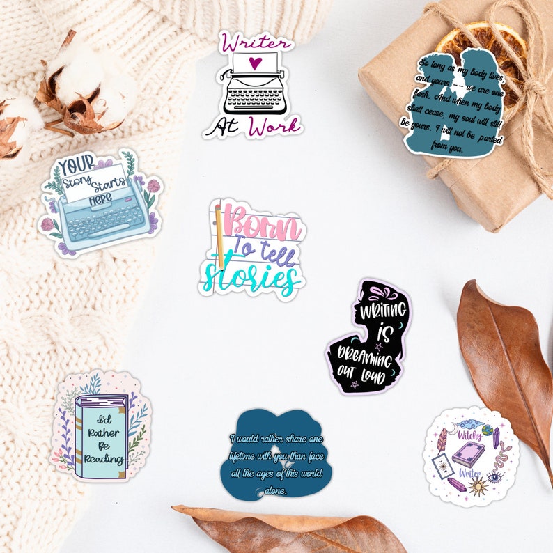 May include: A set of ten colorful stickers featuring quotes about writing and reading. The stickers are printed on white, round, glossy paper. The stickers feature a typewriter, a book, a pen, and a heart.
