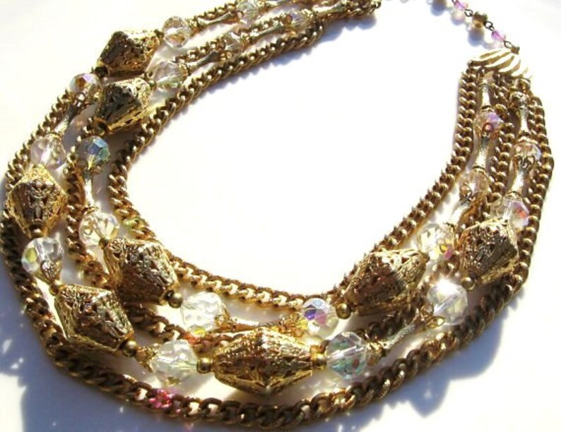 Vintage gold and aurora borealis necklace with matching clip on earrings