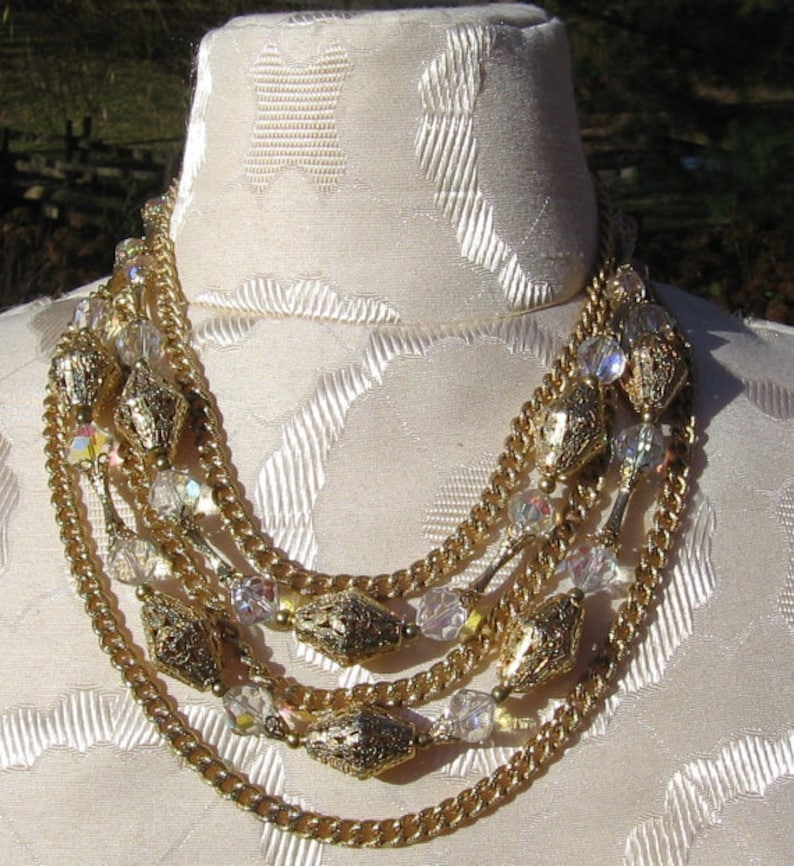 Vintage gold and aurora borealis necklace with matching clip on earrings
