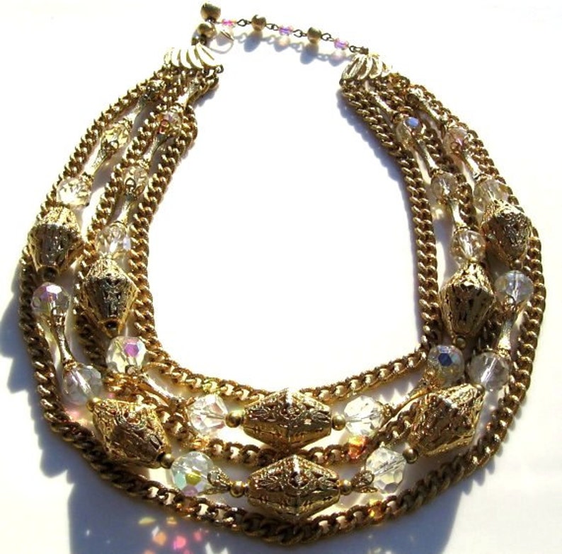 Vintage gold and aurora borealis necklace with matching clip on earrings