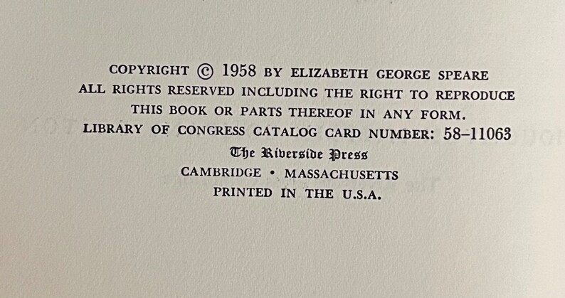 May include: Copyright information for a book published in 1958 by Elizabeth George Speare. The book is titled "The Riverside Press" and was printed in the U.S.A.