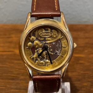 1990’s Disney Store Exclusive Brass Toned Mickey Mouse Skeleton Watch- Vintage Unisex Disney Store Mickey Mouse and Visible Gears Watch