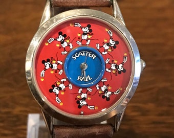 1990 年代のディズニーストア限定、ミッキーが年月を経て回転する