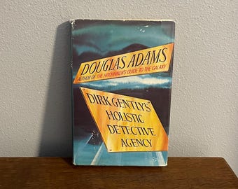 1987 First Book Club Edition of Dirk Gently’s Holidtic Detective Agency by Douglas Adams