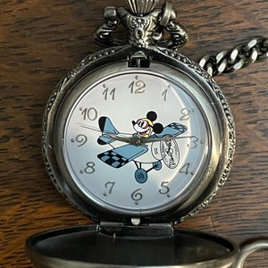 1990’s Mickey on the Move Pocket Watch Collection Pocket Watch- Vintage Mickey Flying a Plane Pocket Watch