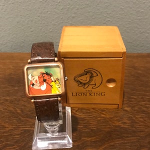 Reloj vintage unisex de Simba, Timón y Pumba, exclusivo de Disney de los años 90 (tarjeta de crédito)