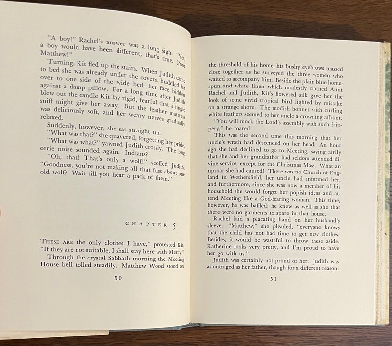 May include: A book open to a page with the title "Chapter 5" and text about a family preparing for a church meeting. The text describes a disagreement between a woman and her uncle about her clothing choices.