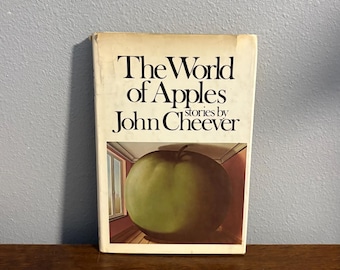 Primera edición, sexta impresión de El mundo de las manzanas, de John Cheever.