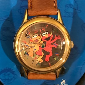 1990’s Fantasma Elmo and Zoe Watch - Vintage Women’s Sesame Street Elmo and Zoe Confetti Watch