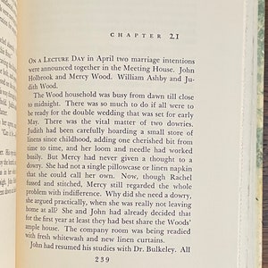 May include: A page from a vintage book with the chapter title "Chapter 21" and text about a wedding. The text describes the preparations for a double wedding and mentions the bride's dowries.