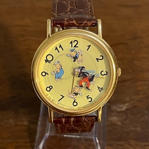 Reloj de pulsera unisex vintage de Los tres cerditos de Disney de Lorus, década de 1980