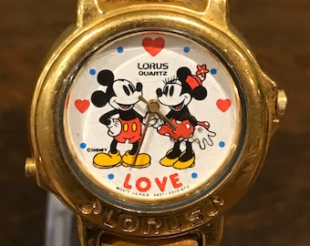 Reloj musical Lorus de Mickey y Minnie Mouse de los años 90: reloj musical vintage de Disney de Mickey y Minnie que reproduce "I Wanna Hold Your Hand".