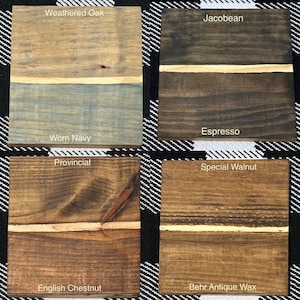 Puede incluir: Cuatro muestras de tinte para madera, cada una con un color y un nombre diferentes. La fila superior muestra Roble desgastado y Jacobean. La fila inferior muestra Azul marino desgastado, Provincial, Nogal especial y Cera antigua Behr.