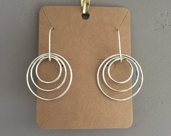 Progressive circle sterling silver earrings