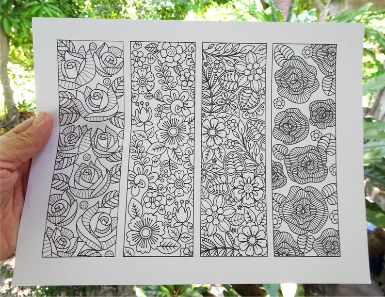 showing printouts of zen doodle flower coloring markers