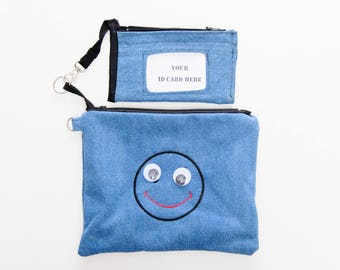 Money Face Emoji Etsy - smiley face with big wiggle eyes and a red smile wrislet attachable id and money pouch