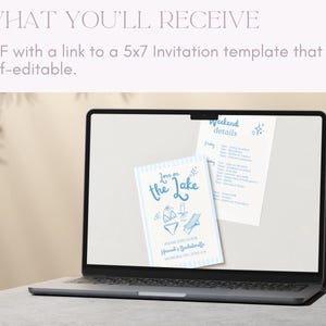 May include: A laptop screen displaying a digital mockup of a 5x7 invitation template. The invitation is for a lake-themed event and features the text "Love on the Lake" with a blue and white striped background. The invitation also includes a small illustration of a swimsuit, a cocktail, and a sun lounger.