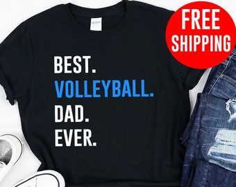 May include: Black t-shirt with the text "BEST. VOLLEYBALL. DAD. EVER." in white and blue lettering.