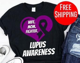 May include: Black t-shirt with a purple heart and ribbon, and the text "Wife. Mom. Fighter. Lupus Awareness".