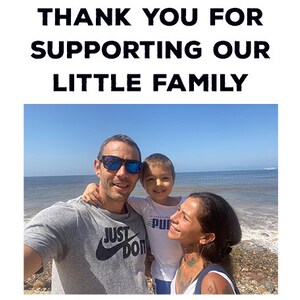 May include: A family portrait taken at the beach, with the text "THANK YOU FOR SUPPORTING OUR LITTLE FAMILY" at the top. The family consists of a man, a woman, and a child, all smiling. The man wears a gray t-shirt with a Nike logo.