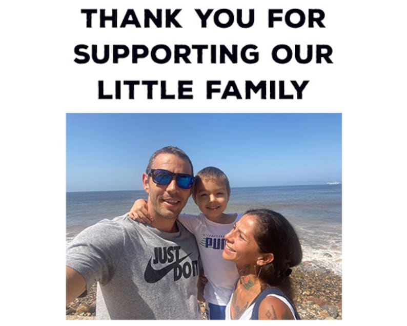 May include: A family portrait taken at the beach, with the text "THANK YOU FOR SUPPORTING OUR LITTLE FAMILY" at the top. The family consists of a man, a woman, and a child, all smiling. The man wears a gray t-shirt with a Nike logo.