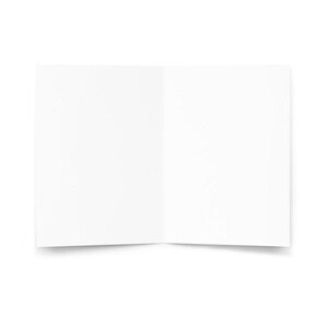 May include: A blank, white, folded greeting card, open to reveal a clean, empty interior. The card is centered, with a slight shadow beneath, suggesting it's resting on a surface. Ideal for personalized messages or creative projects.