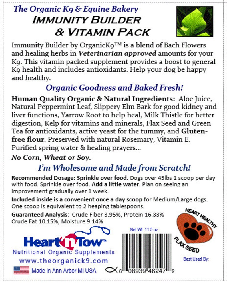 May include: A red and white label with the text "The Organic K9 & Equine Bakery" and "Immunity Builder & Vitamin Pack". The label features a green leaf and a red heart with a paw print. The label also includes a list of ingredients and a recommended dosage for dogs. The label is for a nutritional supplement for dogs.