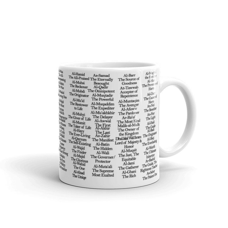 May include: A white ceramic mug with a black and white design featuring a list of names and titles in Arabic script. The text translates to "The All-Praised, The Eternally Besought, The Source of Goodness, The Accepter of Repentance, The Avenger, The Pardoner, The Most Kind, The Owner of the Kingdom, The Ever-Living, The Hidden, The Just, The Equitable, The Gatherer, The Rich".
