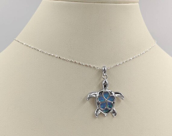 Sterling Silver Turtle Pendant with Pink Opal Plumeria Center Sterling Silver Turtle Pendant with Pink Opal Plumeria Center
