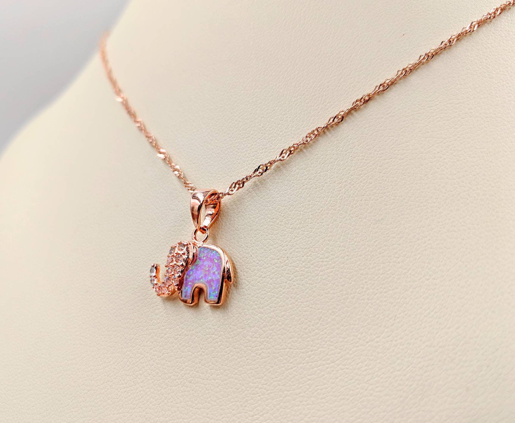 10k Rose Gold Ethiopian Opal Cushion Stud Earrings – Pinctore Rose Gold Elephant Earrings with Opal Accents display picture 1