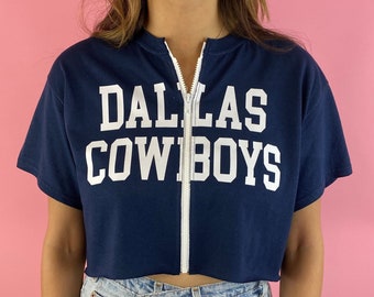 Camiseta corta con cremallera de los Dallas Cowboys