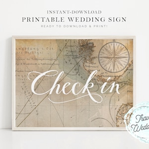 May include: Printable wedding sign with a vintage map background and a compass rose. The sign says "Check in" in white cursive text. The sign is framed in a white frame.