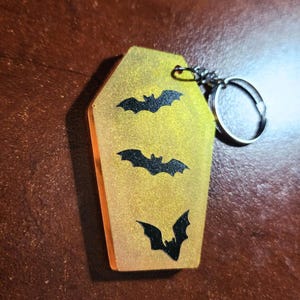 Iridescent Orange Coffin Keychain with Black Bats – Witchy Occult Keychain, Gothic Aesthetic, Spooky Gift, Bat Keychain