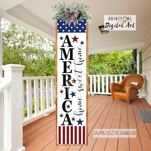 May include: A wooden sign with the word "AMERICA" in large black letters, red and blue stars, and the words "home sweet home" in script. The top of the sign has a blue and white star pattern and is decorated with greenery and a bow. The bottom has red and white stripes.