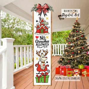 May include: A wooden Christmas sign with a red and white checkered bow and greenery at the top. The sign features a red house with the word "Merry!" and the phrase "NO Grouches ALLOWED" with a cartoon dog in a sleigh. A Christmas tree and presents are in the background.