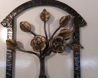 A uinique hand forged wrought iron Sculpture of a Flowering Dogwood in a hammer textured rectangular framr with a rounded top & Lacquer fin.
