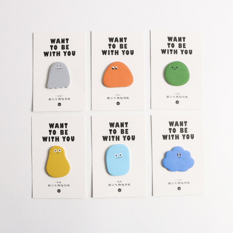 May include: Six colorful sticky notes with the text "Want to be with you" and a cartoon character on each. The characters are a ghost, a blob, a cloud, a yellow blob, a blue blob, and a green blob.