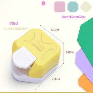 May include: A yellow corner rounder tool with a white lever. The tool is 70mm long, 59mm wide, and 34mm high. The tool is labelled "3 in 1 Corner Rounder".