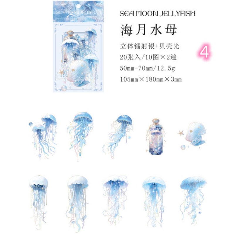 May include: A sheet of 20 decorative stickers featuring blue and white watercolor jellyfish, a bottle with a cork, and a seashell. The stickers are 1.97 inches to 2.76 inches in size and come in a pack of 10 designs. The stickers are labeled "Sea Moon Jellyfish" and "海月水母" in Japanese.