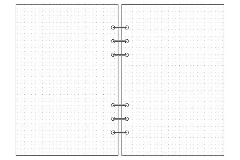 Op de afbeelding: Een blanco, wit, gestippeld notitieboek met een zwarte binding. Het notitieboek is open op twee pagina's.